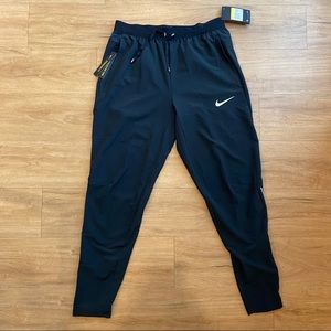 NWT Nike rubbing pants